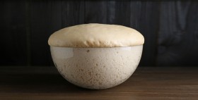 bowl-fresh-yeast-dough-wooden-table